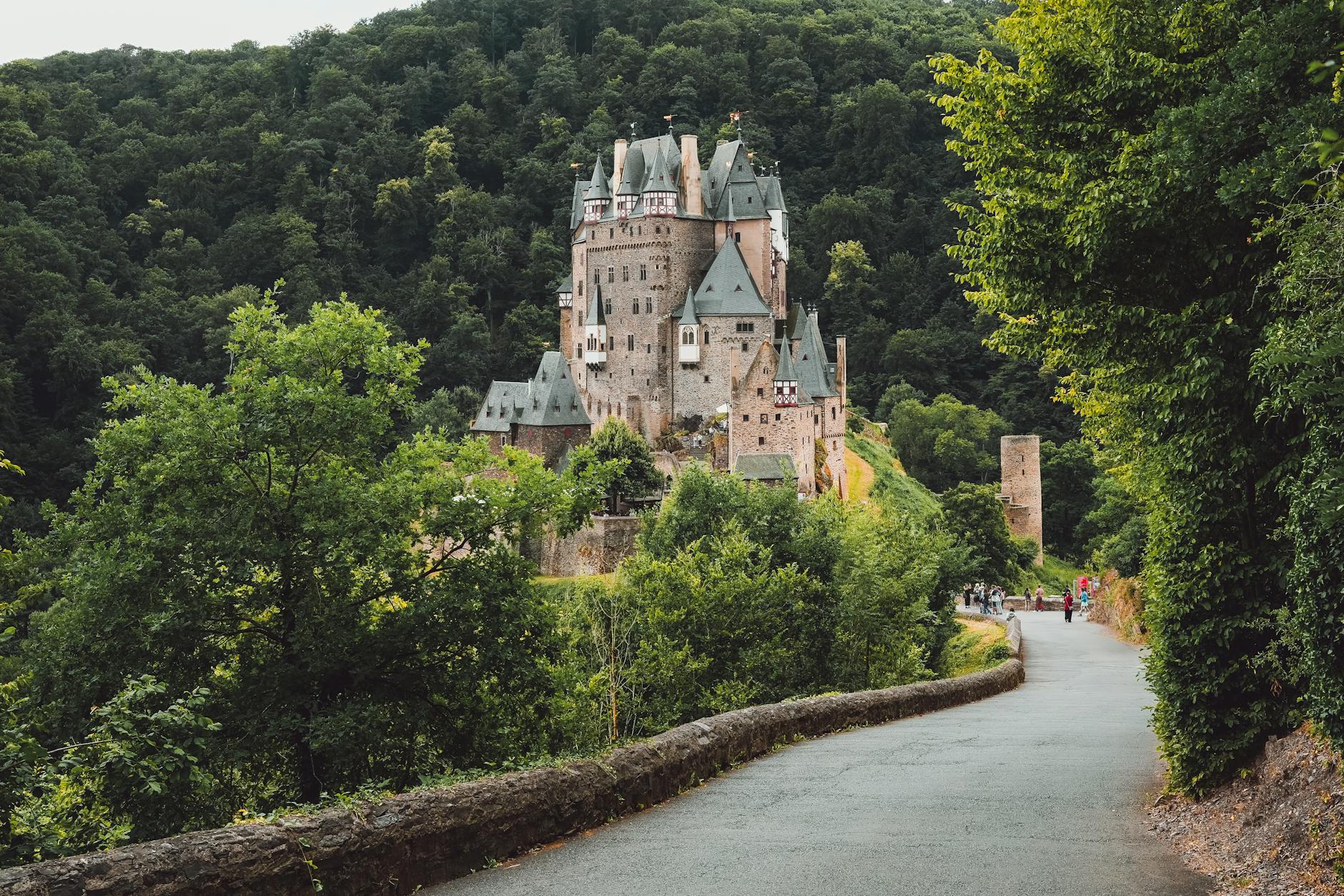 Eltz Castle surrounded by lush greenery, capturing its historic charm in Germany.